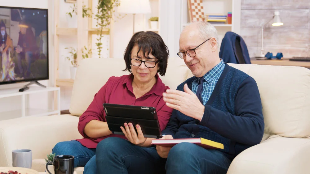 Older couple reviewing transport support options at home