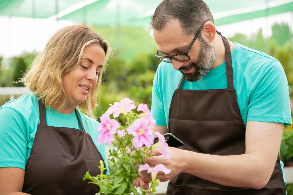 Participant and Support Worker Gardening Together