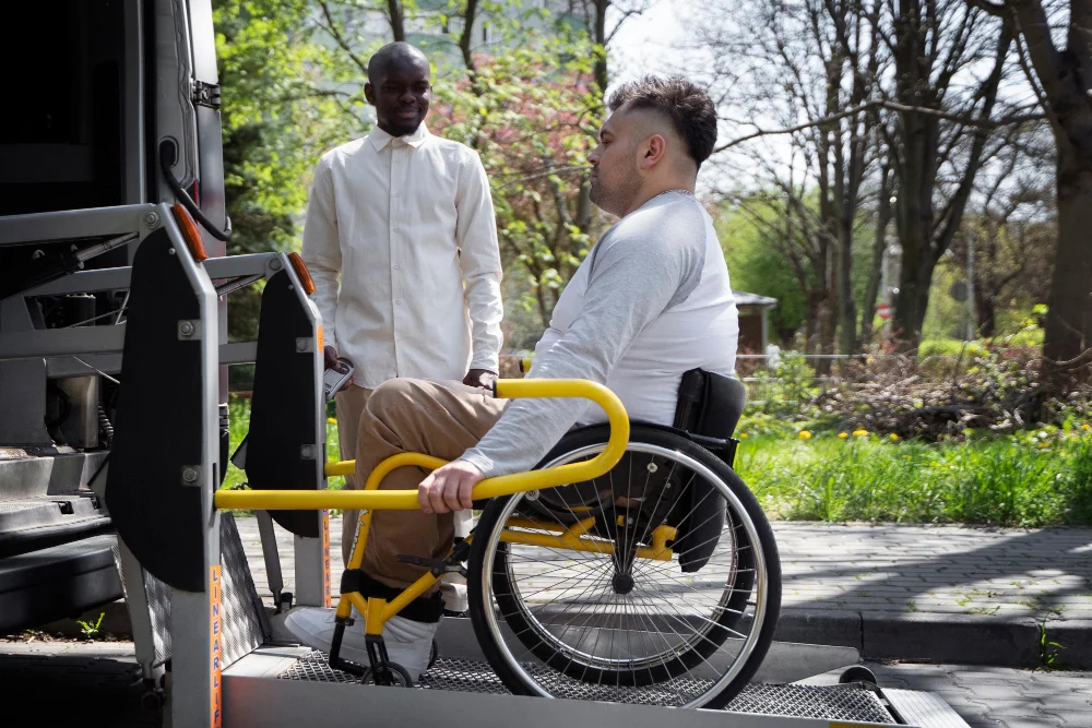 Participant boarding accessible transport with support person