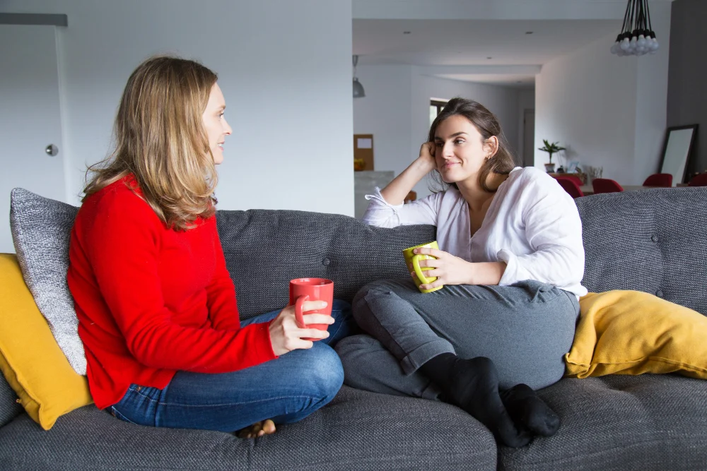 Two-women-discussing-NDIS-options | JNJ Community Support Services | JNJ Community Support Services Support worker assisting an older man at home